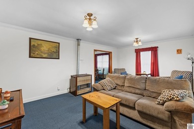 Located in the heart of Grand Rivers, this 3-bedroom, 1 - photo 3