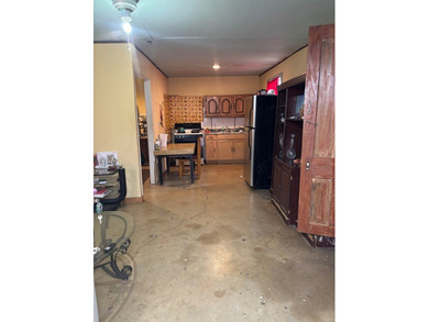 Property has 2 one bedroom, 1 bath apts. in the rear for rent - photo 12