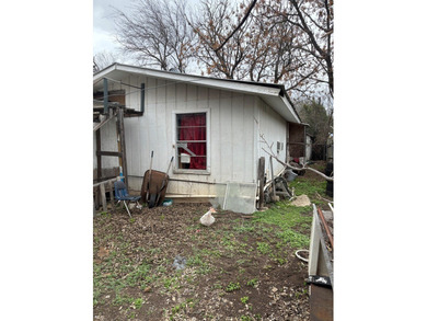Property has 2 one bedroom, 1 bath apts. in the rear for rent - photo 15