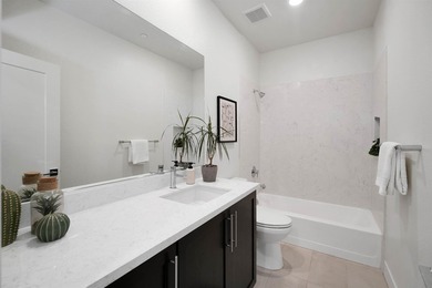 Built in 2021, this sophisticated townhouse-style condominium - photo 16