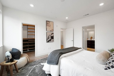 Built in 2021, this sophisticated townhouse-style condominium - photo 19