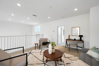 Built in 2021, this sophisticated townhouse-style condominium - photo 24