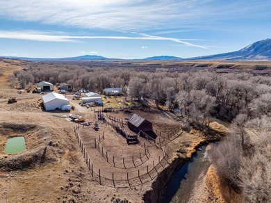 Elk Mountain Ranch consists of 4215 deeded acres and a 640 acre - photo 37