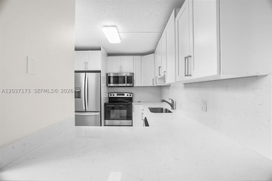 Beautiful first-floor corner unit in desirable Pine Ridge! This - photo 8