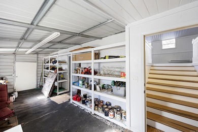 Hidden behind an iron gate, this 93+/- acre luxury estate offers - photo 36