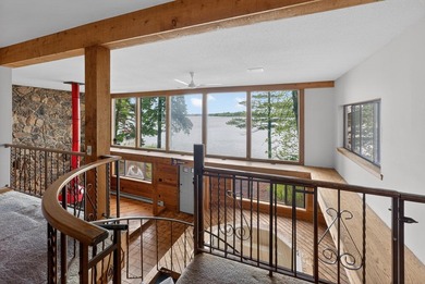Discover a truly unique lakefront retreat filled with character - photo 11