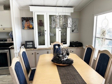 THREE MONTHS FREE LOT RENT**Tons of recent upgrades make this - photo 4