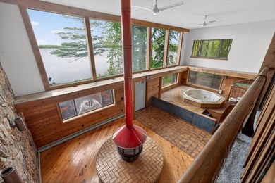 Discover a truly unique lakefront retreat filled with character - photo 20