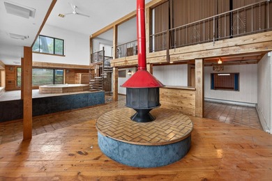 Discover a truly unique lakefront retreat filled with character - photo 25