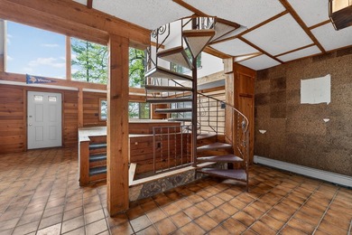 Discover a truly unique lakefront retreat filled with character - photo 37