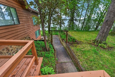 Discover a truly unique lakefront retreat filled with character - photo 40
