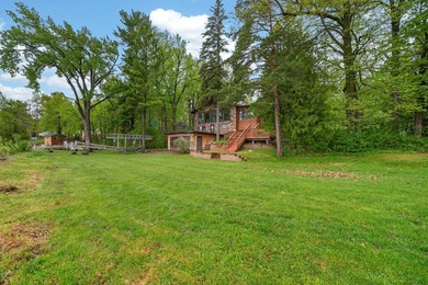 Discover a truly unique lakefront retreat filled with character - photo 45