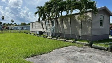 Lake Home For Sale in Homestead, Florida