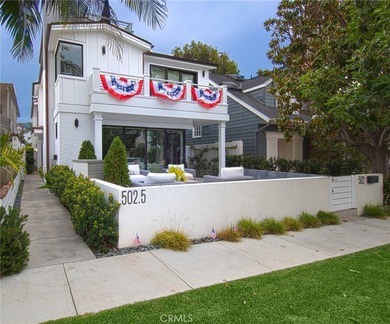 Tucked away on a coveted street south of PCH, this exceptional - photo 1