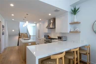 Tucked away on a coveted street south of PCH, this exceptional - photo 6