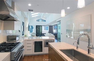 Tucked away on a coveted street south of PCH, this exceptional - photo 7