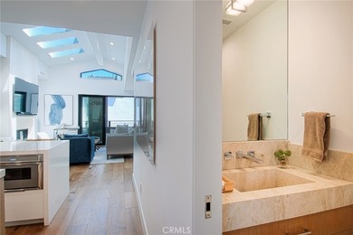 Tucked away on a coveted street south of PCH, this exceptional - photo 9