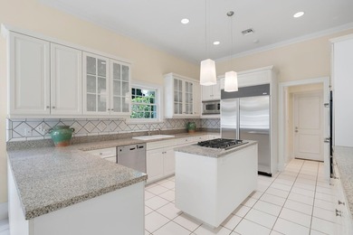This British Colonial residence offers 6,922+/- total square - photo 11