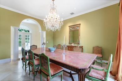 This British Colonial residence offers 6,922+/- total square - photo 12