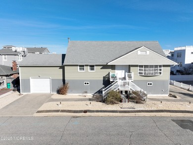 A rare 100ft dock lagoon-front offering in the heart of Beach