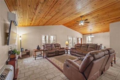 Enjoy seasonal lake views of Beaver Lake from this inviting - photo 5