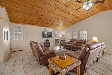 Enjoy seasonal lake views of Beaver Lake from this inviting - photo 6