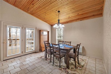 Enjoy seasonal lake views of Beaver Lake from this inviting - photo 7