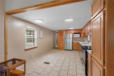 Enjoy seasonal lake views of Beaver Lake from this inviting - photo 10