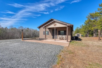 Welcome to this like new custom-built cottage where waterfront - photo 1
