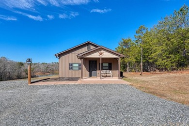 Welcome to this like new custom-built cottage where waterfront - photo 2
