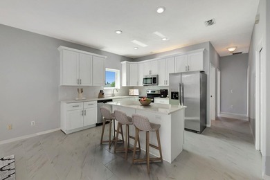 Rare opportunity to own an Ocean Access waterfront pool home on - photo 8