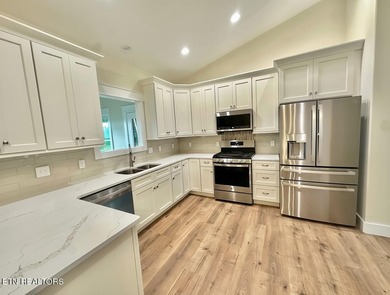 Stunning brick front New Construction! This 3 bedrooms, 2 bath - photo 9