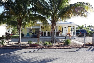 Welcome to this solid waterfront 2-bedroom, 2-bathroom - photo 1