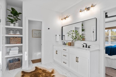 Welcome to this beautiful 4-bedroom, 3.5-bath lake home in the - photo 24