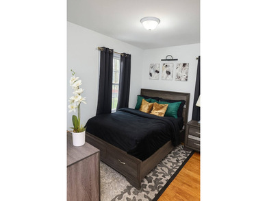 Welcome to 115-29 145th Street! A warm, beautifully curated - photo 3