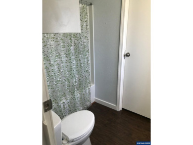 Well maintained home awaits you! Spacious kitchen w/ ample