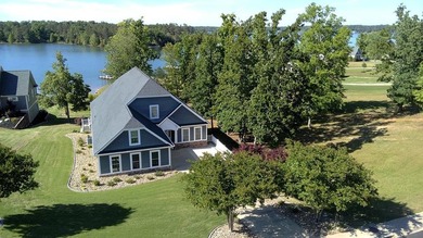 Welcome to this beautiful well-appointed lakefront home in the - photo 3