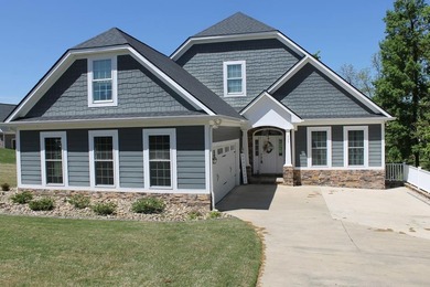 Welcome to this beautiful well-appointed lakefront home in the - photo 6
