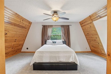 Enjoy lake-area living in this charming A-frame home located in - photo 19