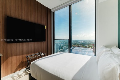 Experience sophisticated urban living in this fully furnished - photo 2