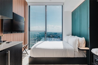 Experience sophisticated urban living in this fully furnished - photo 4