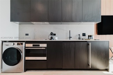 Experience sophisticated urban living in this fully furnished - photo 9