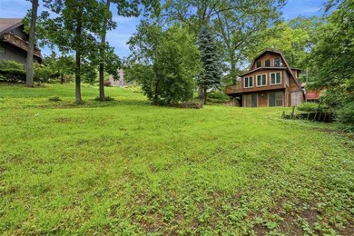 Enjoy lake-area living in this charming A-frame home located in - photo 36