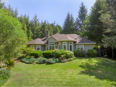 Tucked away on over an acre of wooded privacy, this custom - photo 1