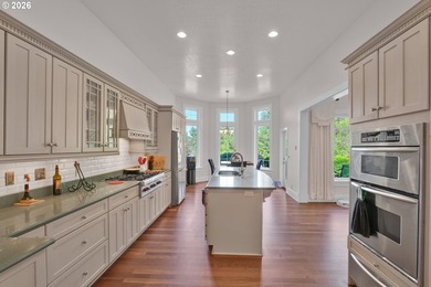 Tucked away on over an acre of wooded privacy, this custom - photo 9