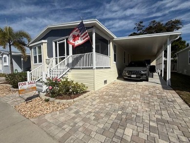 Welcome home to this beautifully appointed mobile home nestled - photo 3