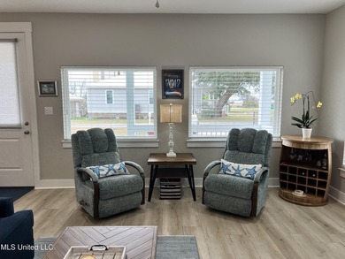 Wake up to coastal breezes and water views in this beautiful - photo 8