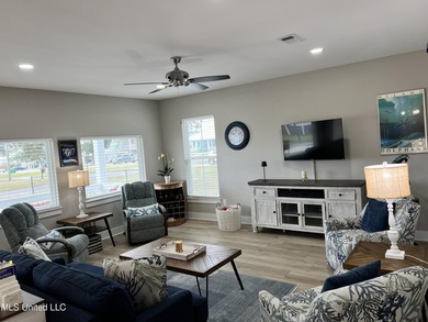 Wake up to coastal breezes and water views in this beautiful - photo 10