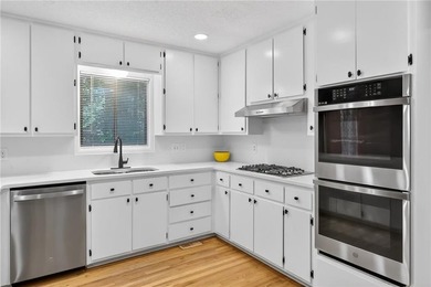Tucked away on nearly an acre in the highly sought-after - photo 11