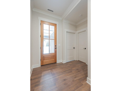 This new, one-level home is situated on .75+/- acres, built with - photo 4